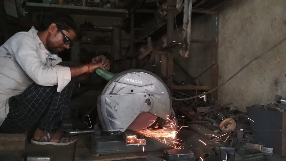 Professional welder working with sparks flying